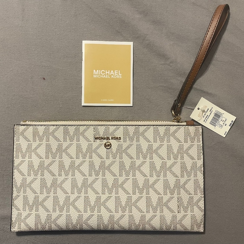 White brand, new, authentic Michael Kors wristlet